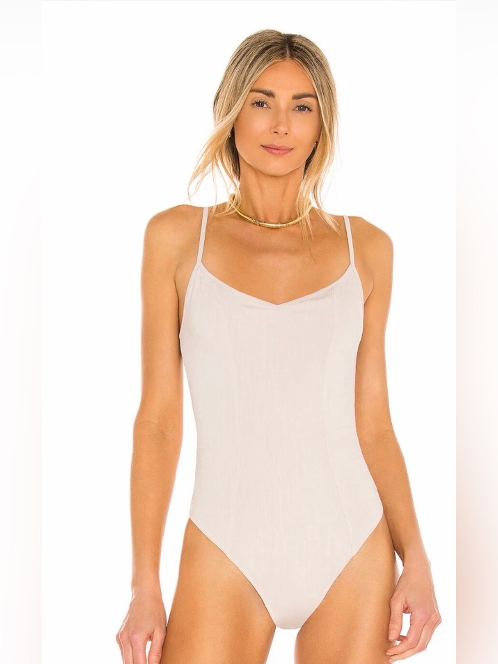 Free People ivory spaghetti strap bodysuit with the Strappy Basic Bodysuit.